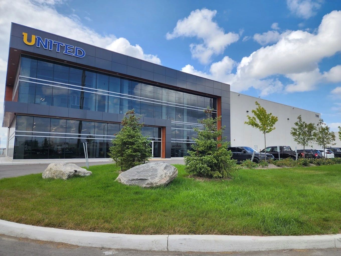 The United head office on Huntington Road in Woodbridge, with the UNITED name on its glass facade